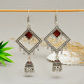 Traditional Oxidised Silver Diamond-Shape Red Stone Jhumka Earrings – Handcrafted Artisanal Statement Jewelry