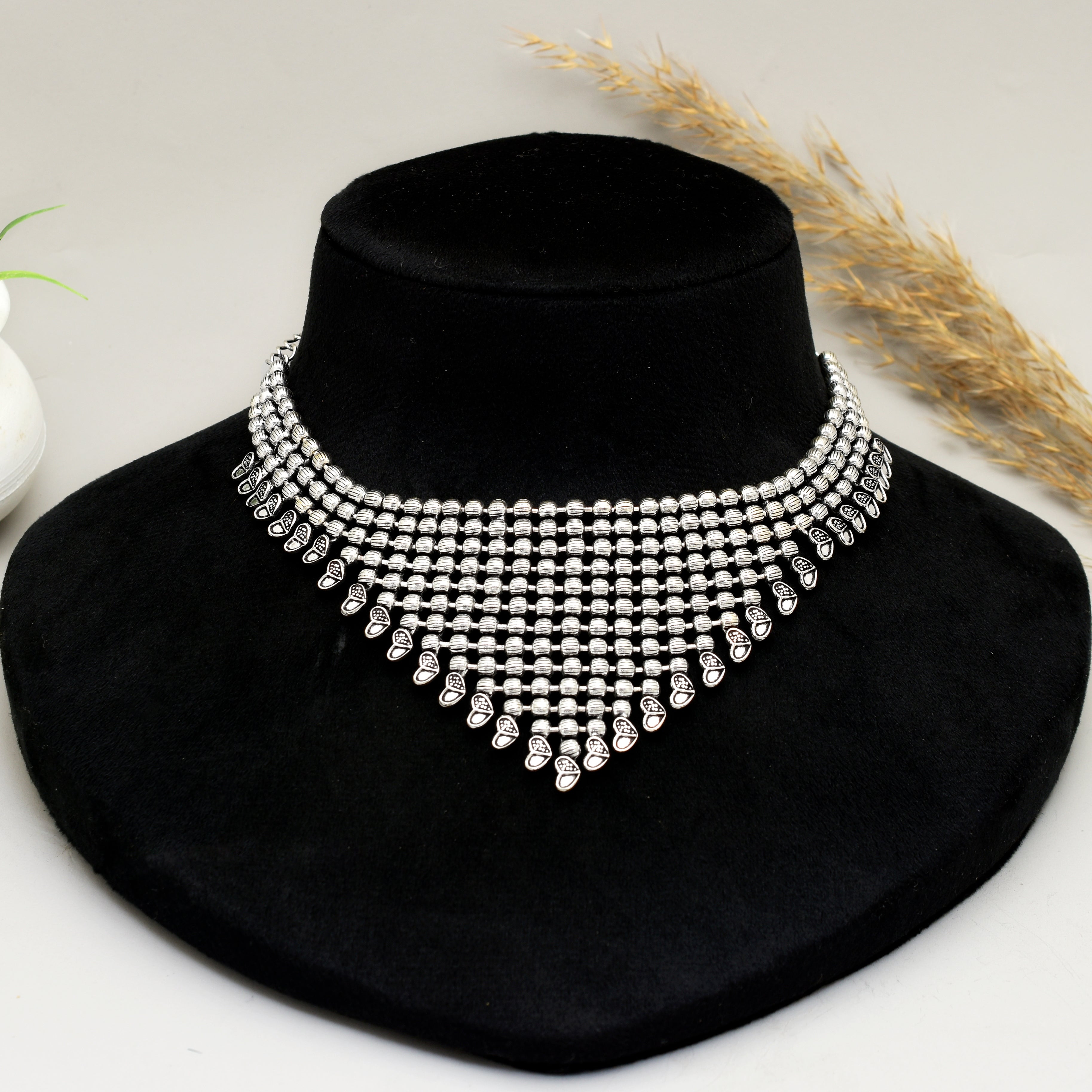 Exquisite Handcrafted Viraasi Oxidised Silver-Toned-Row Beaded Bib Choker Necklace with Engraved Floral Leaf Charms